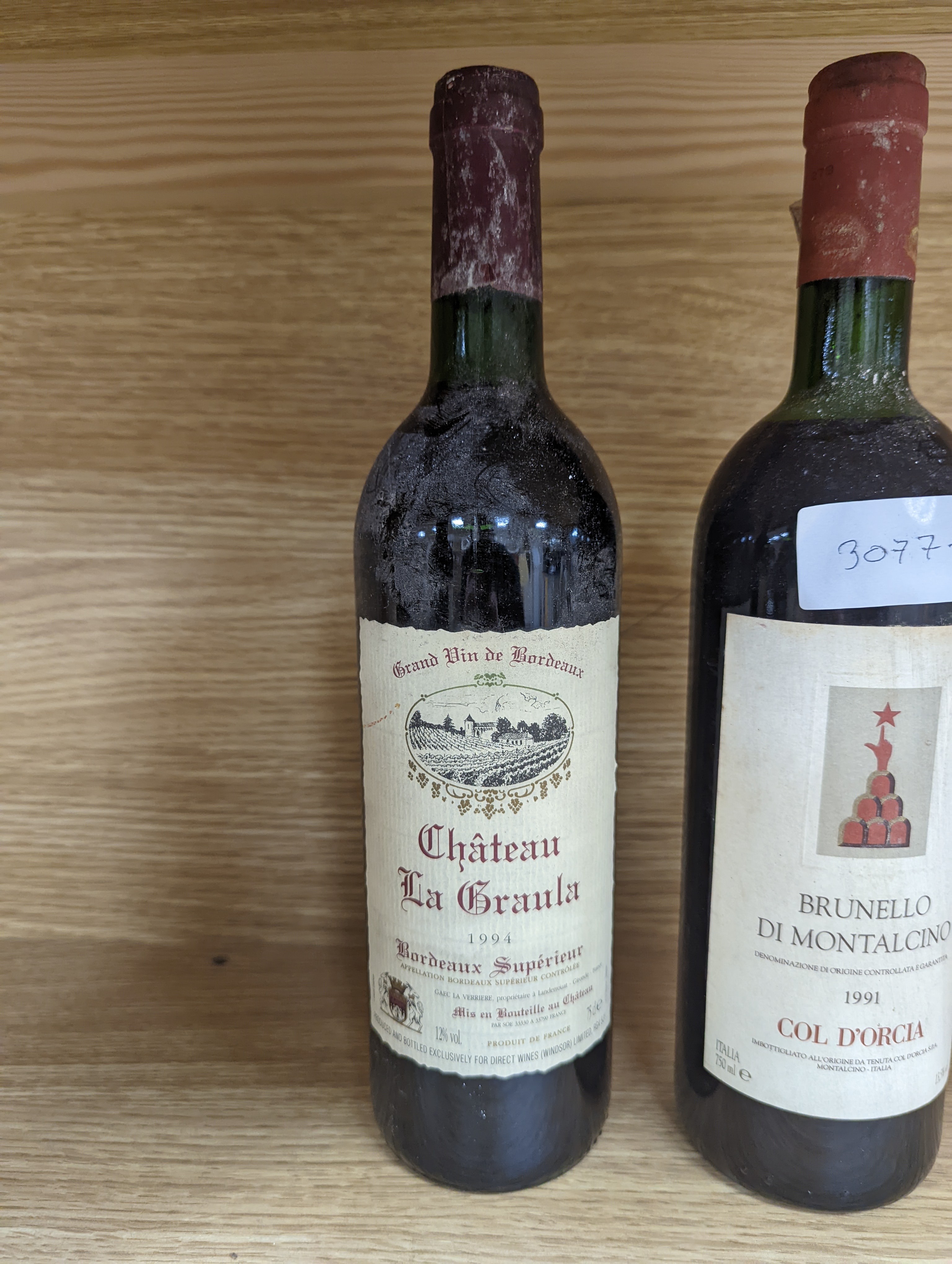 Twelve assorted bottles of wine including one Opus One, 1988, one Vosne Romanee, Jean Paul Selles, 1992, one Chateau Cazauviel, Margaux 1993, Chateau Pontet-Canet, 1986 and Brunello Montalcino, 1985 & 1991 etc.